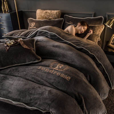 Four Piece Bedding Set With Embroidery And Milk Plush Binding