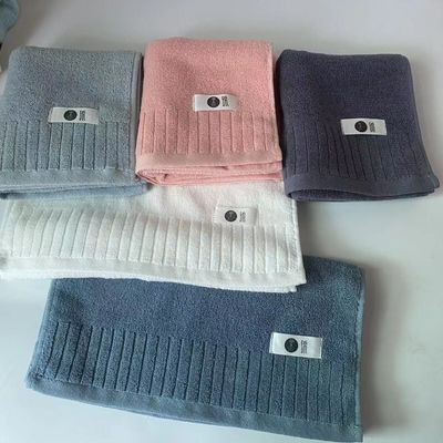 Soft and plush cotton bath towel with double-sided extreme strand plain striped design