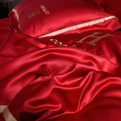 Luxury Embroidered Washing Silk Bedding Set with Polyester Material and Customized Logo