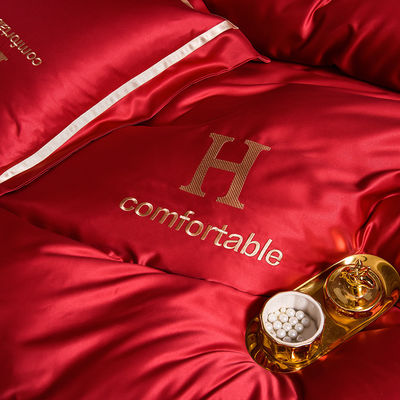 Luxury Embroidered Washing Silk Bedding Set with Polyester Material and Customized Logo