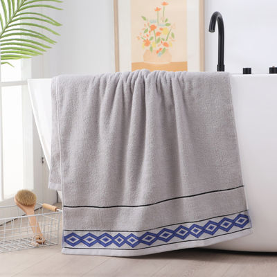 A Solid Color Rectangle Bath Towel for Adult Bathing a Replacement Advertising Towel