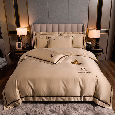 Customized Logo Winter Embroidered Polyester Washed Silky Bedding Set for Solid Color
