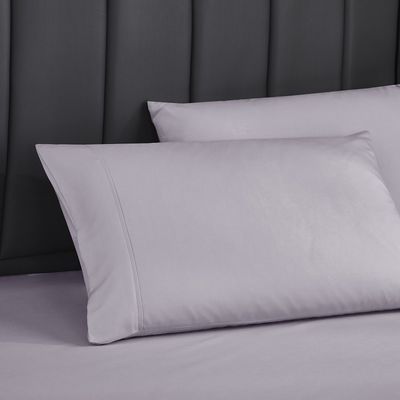 Add a Touch of Elegance to Your Bed with Embroidered Bedding Sets and Matching Curtains